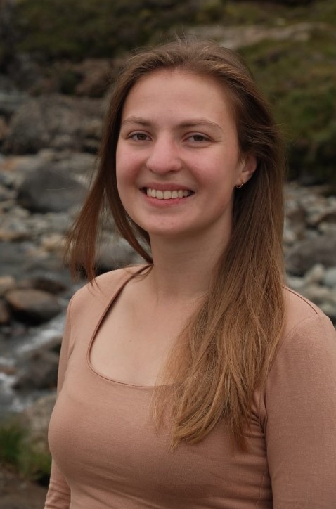 Ein blaues symbol einer person ohne gesicht auf weißem hintergrund.